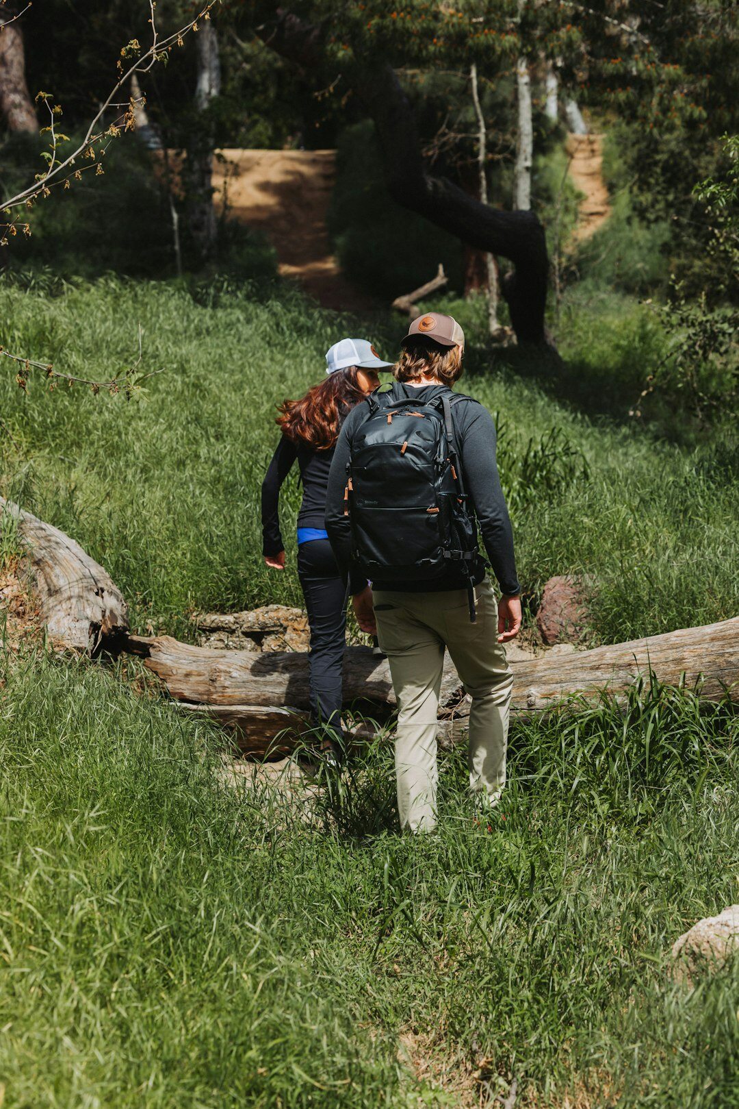 elderly couple hiking in spring