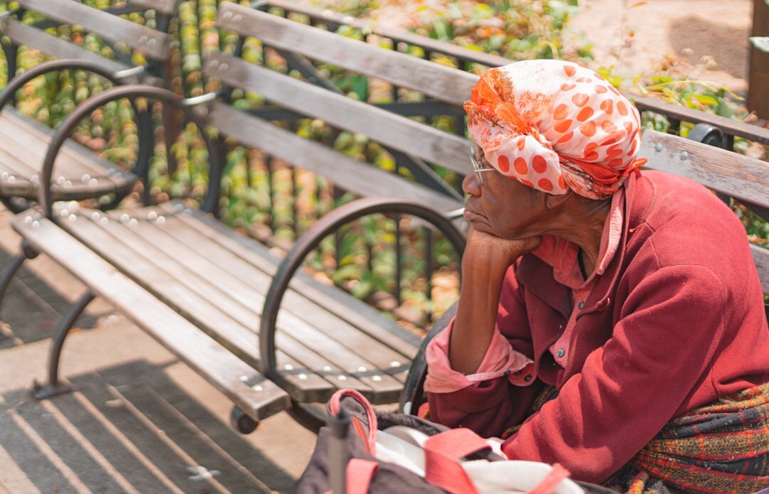 senior woman relaxing on bench