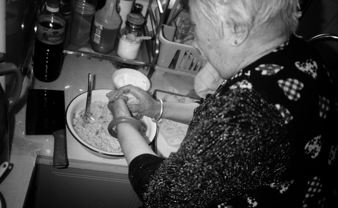 elderly couple cooking