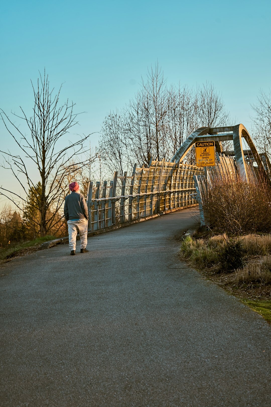 elderly person walking in park